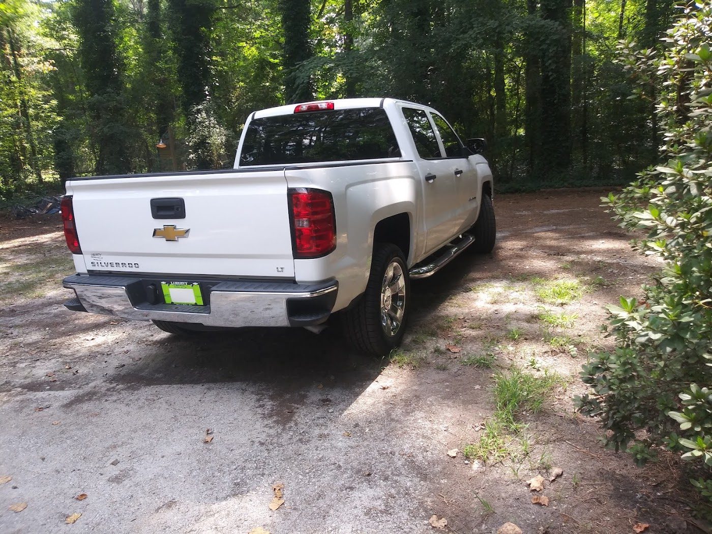 White pickup truck, rear